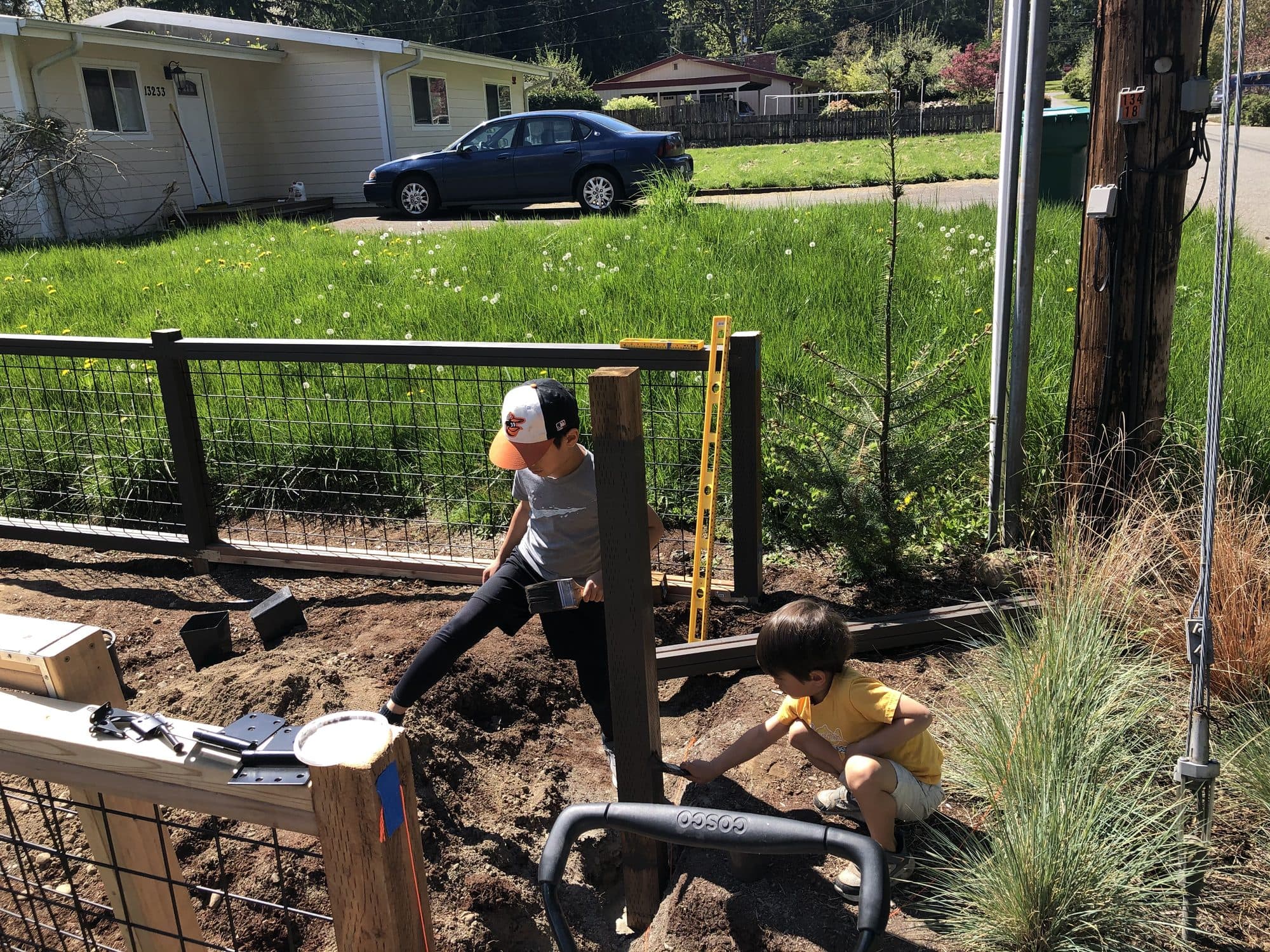 Setting the gate post at the corner of the enclosure