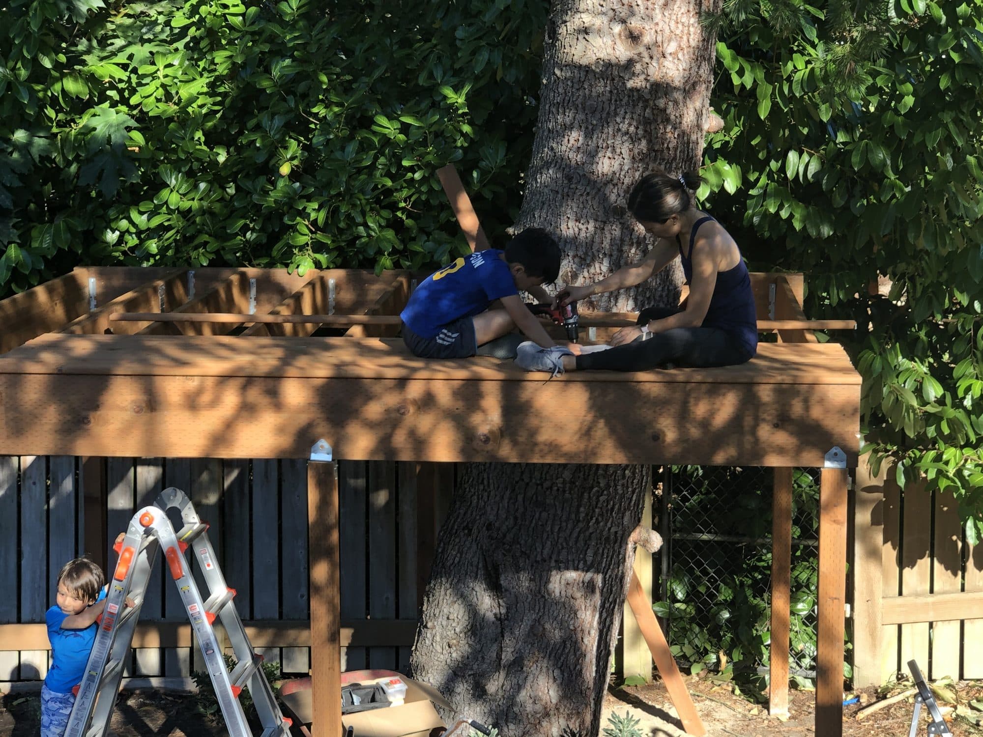 Two people working on the finished platform
